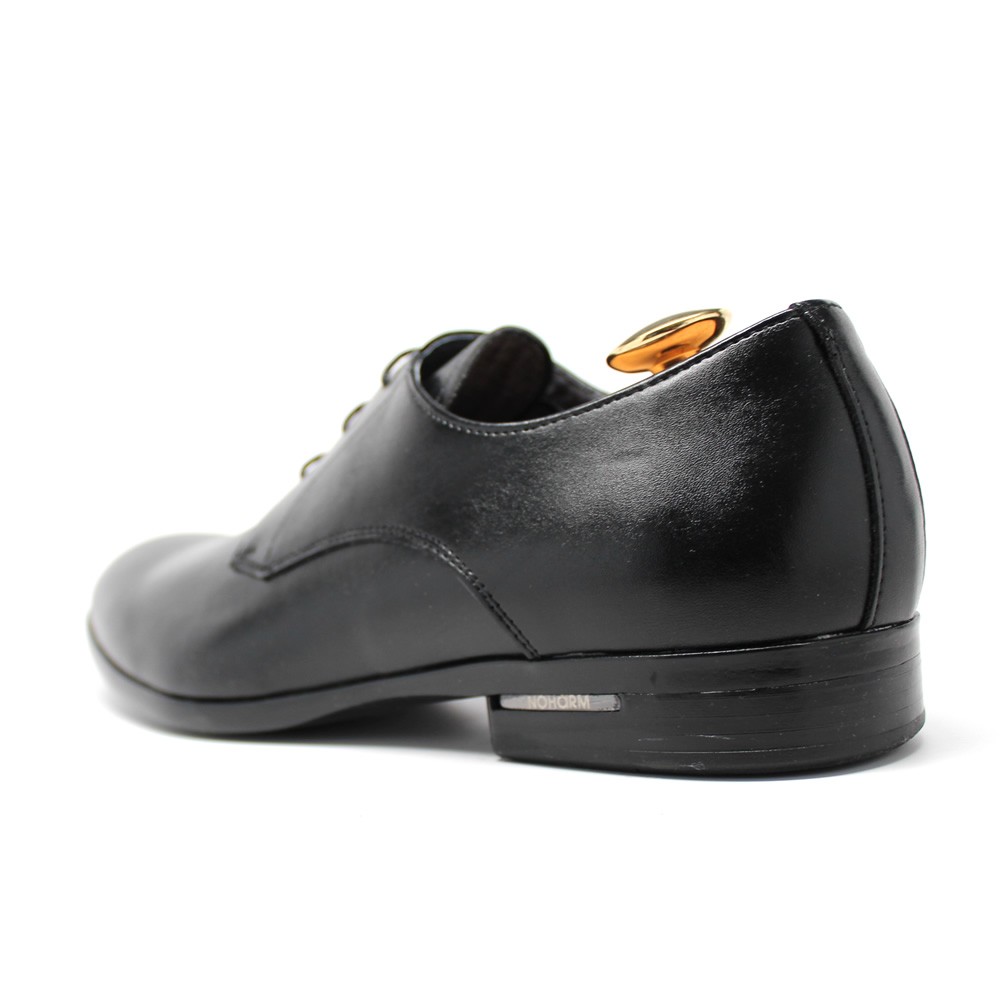 Side profile of NOHARM® luxury shoe showing detailed design
