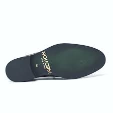 NOHARM® shoe sole with gold logo branding